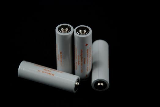 isolated pictores of electrical batteries on black background