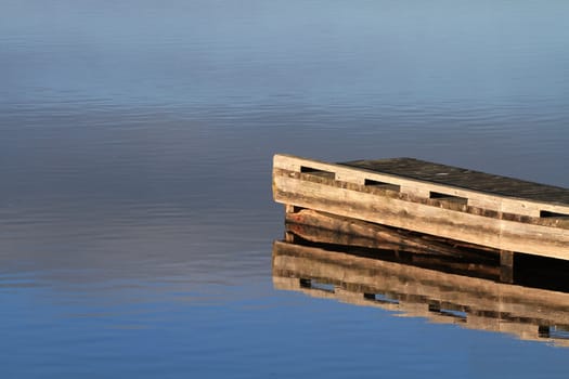 Morning sun on dock late summer light