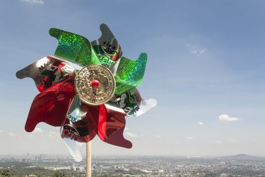 Mexican Rehilete memorial to September 15. Background can appreciate valley of Mexico and the blue sky with clouds