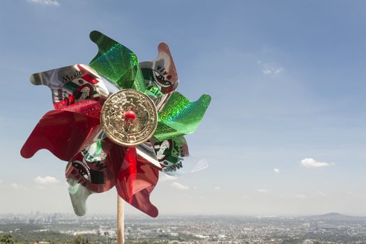Mexican Rehilete memorial to September 15. Background can appreciate valley of Mexico and the blue sky with clouds