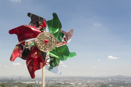 Mexican Rehilete memorial to September 15. Background can appreciate valley of Mexico and the blue sky with clouds