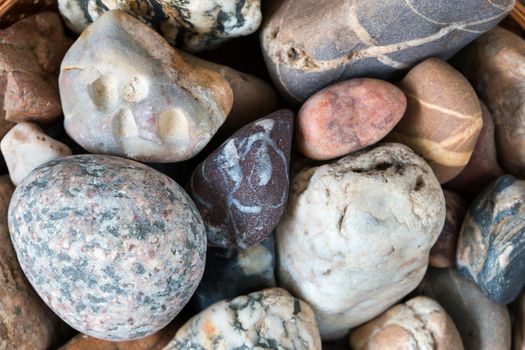 Detail of the various sea pebbles - gravel stones - small depth of field