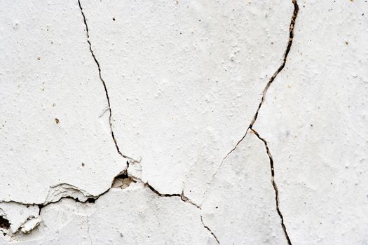 Detail of the old and cracked plaster - grunge texture