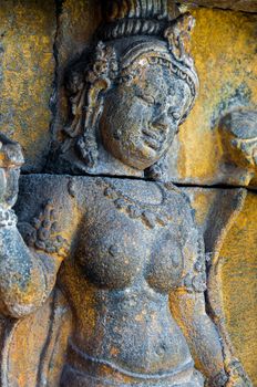 A Buddha encarved in stone at temple of Borobudur Indonesia