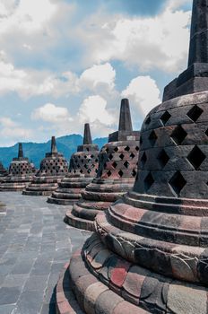 Stupa at Borobudur on a cloudy day in Indonesia