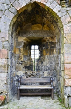 Wooden bench inside fan valut on Cliffords Tower in York


