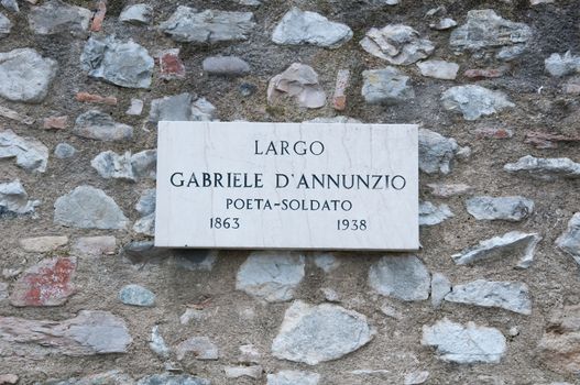 Road sign indicating a street name in Italian "Gabriele D'Annunzio" in English means Gabriele D'Annuznio an Italian poet.