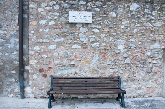 Road sign indicating a street name in Italian "Gabriele D'Annunzio" in English means Gabriele D'Annuznio an Italian poet.