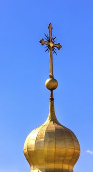 Saint Sophia Sofia Cathedral Spire Tower Cross Golden Dome Sofiyskaya Square Kiev Ukraine.  Saint Sophia is oldest Cathedral and Church in Kiev.  Saint Sofia was built by King Yaroslov the Wise in 1037.