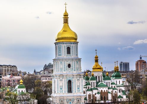 Saint Sophia Sofia Cathedral Spires Towe Golden Dome Sofiyskaya Square Kiev Ukraine.  Saint Sophia is oldest Cathedral and Church in Kiev.  Saint Sofia was built by King Yaroslov the Wise in 1037.