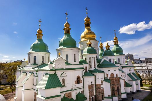 Saint Sophia Sofia Cathedral Spires Tower Golden Dome Sofiyskaya Square Kiev Ukraine.  Saint Sophia is oldest Cathedral and Church in Kiev.  Saint Sofia was built by King Yaroslov the Wise in 1037.