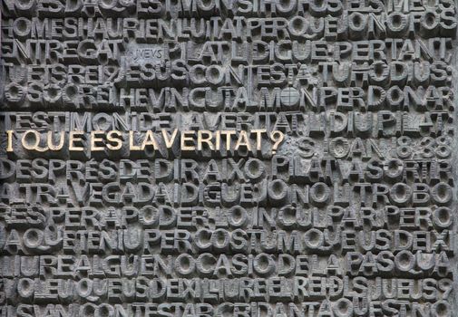 Barcelona, Spain - September 22, 2015: Writing on the Passion Facade of Gaudi's Sagrada Familia. Gaudi's profound catholicism inspired his designs of Sagrada Familia.