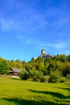 Landscape view of old traditional house and castle in Stara Lubovna, Slovakia, Eastern Europe