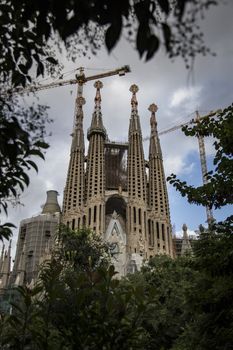 Barcelona, Spain - September 19, 2015: Sagrada Familia Passion facade side. Gaudi's profound catholicism inspired his designs of Sagrada Familia.