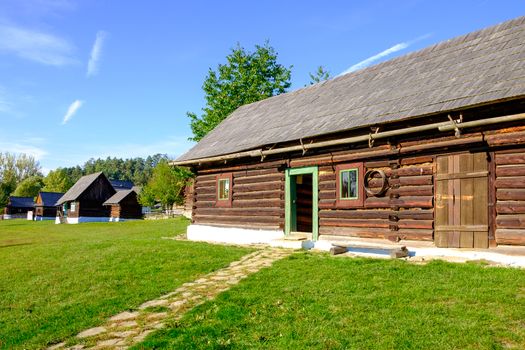 Old wooden barn and traditional village houses in open air museum Stara Lubovna, Slovakia, Eastern Europe
