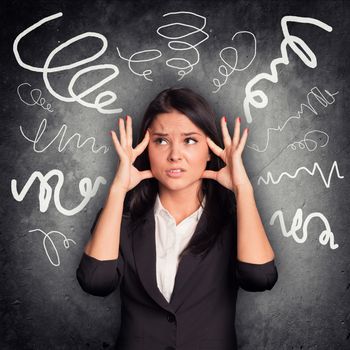 Stressed woman looking at left angle on abstract background