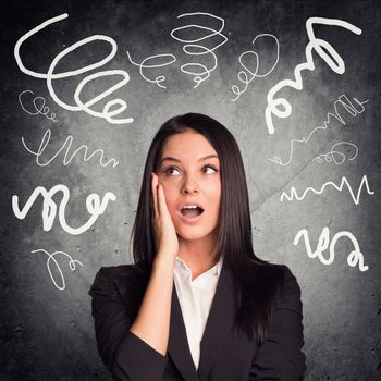 Surprised woman with open mouth on abstract background