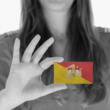 Woman in red showing a blank business card