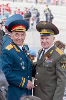 Samara, Russia - May 9, 2015: Meeting of two generals old friends on celebration on annual Victory Day