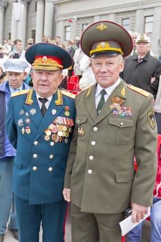 Samara, Russia - May 9, 2015: Meeting of two generals old friends on celebration on annual Victory Day