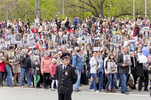 Samara, Russia - May 9, 2015: Procession of the people in Immortal Regiment on annual Victory Day