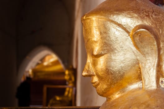 Buddha gold statue close-up in temple bagan myanmar