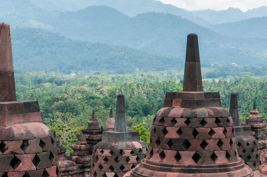 Stupas on top of Borobudur near Yogyakarta in Indonesia