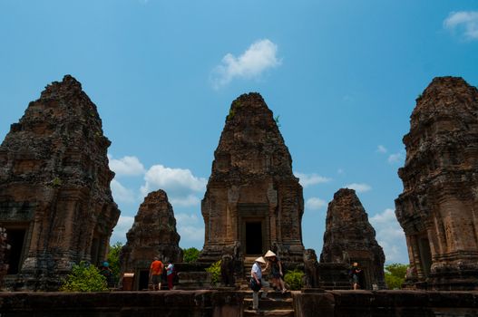 Five stone temples with people at Angkor Wat