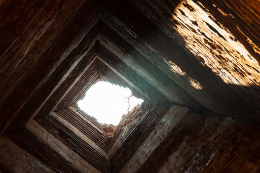 Ray of light falling in a stone temple in Angkor Wat