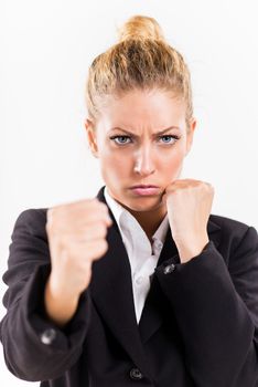 Angry Businesswoman boxing punching towards camera ready to fight.