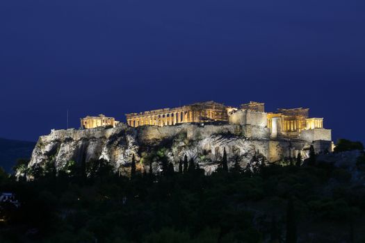 The Acropolis and Parthenon at night in Athens, Greece