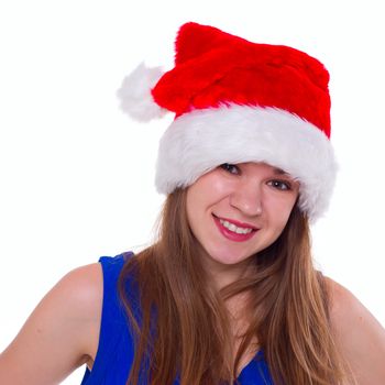 Expressive emotional girl in a Christmas hat on a white background. isolate