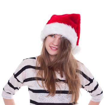 Expressive emotional girl in a Christmas hat on a white background. isolate