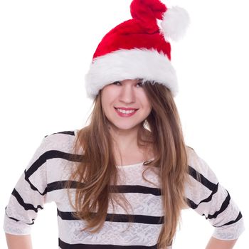 Expressive emotional girl in a Christmas hat on a white background. isolate