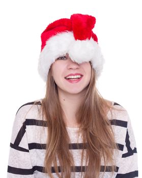 Expressive emotional girl in a Christmas hat on a white background. isolate