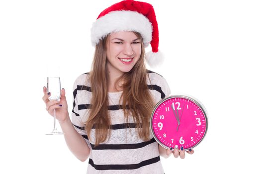 beautiful young woman with clock and glass of champagne, isolated on white