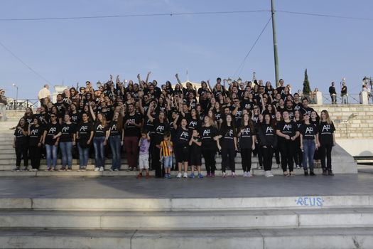 GREECE, Athens: Athens residents pose for a photo while participating in the Walk for Freedom, a global initiative against human trafficking by the A21 Campaign, on October 17, 2015. The walk was one of several held worldwide by the organisation, which aims to raise awareness of human trafficking and provide support to survivors.   	