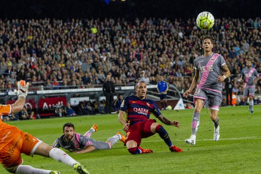 SPAIN, Barcelona: Players from Barcelona and Rayo Vallecano face off during a match on the eighth matchday of La Liga at Camp Nou stadium, Barcelona on October 17, 2015. The host team claimed victory with a final score of 5-2.  