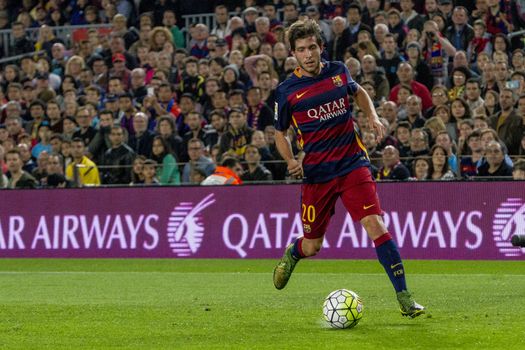 SPAIN, Barcelona: Sergi Roberto of Barcelona approaches the ball during a match against Rayo Vallecano on the eighth matchday of La Liga at Camp Nou stadium, Barcelona on October 17, 2015. The host team claimed victory with a final score of 5-2. 