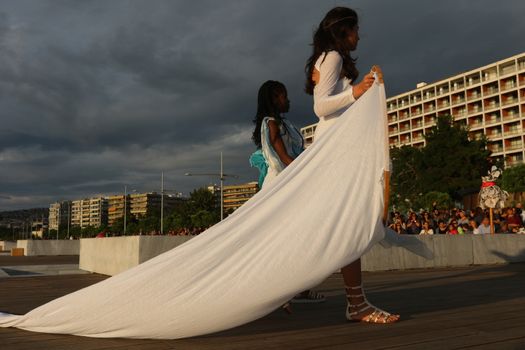 GREECE, Thessaloniki: A quirky outdoor fashion show with clothing made of recycled materials was held on the seafront promenade of Thessaloniki, northern Greece on September 28, 2015.	Professional designers, amateurs, fashionistas, architects and artists inspired by the city, the sea, the sky, the light and the colors of the New Promenade made unique creations from worthless items and recycled fabrics.