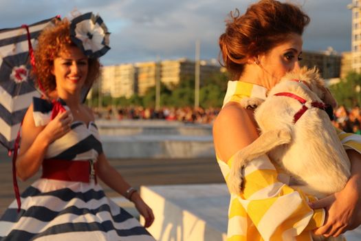 GREECE, Thessaloniki: A quirky outdoor fashion show with clothing made of recycled materials was held on the seafront promenade of Thessaloniki, northern Greece on September 28, 2015.	Professional designers, amateurs, fashionistas, architects and artists inspired by the city, the sea, the sky, the light and the colors of the New Promenade made unique creations from worthless items and recycled fabrics.