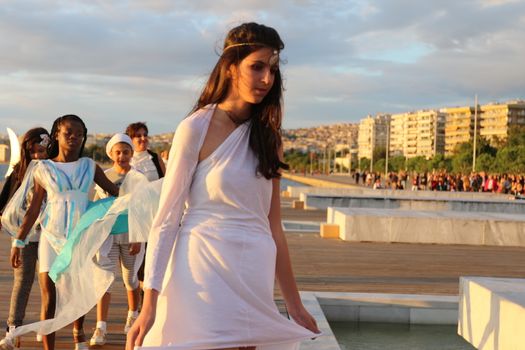 GREECE, Thessaloniki: A quirky outdoor fashion show with clothing made of recycled materials was held on the seafront promenade of Thessaloniki, northern Greece on September 28, 2015.	Professional designers, amateurs, fashionistas, architects and artists inspired by the city, the sea, the sky, the light and the colors of the New Promenade made unique creations from worthless items and recycled fabrics.