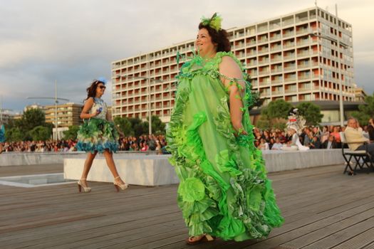 GREECE, Thessaloniki: A quirky outdoor fashion show with clothing made of recycled materials was held on the seafront promenade of Thessaloniki, northern Greece on September 28, 2015.	Professional designers, amateurs, fashionistas, architects and artists inspired by the city, the sea, the sky, the light and the colors of the New Promenade made unique creations from worthless items and recycled fabrics.