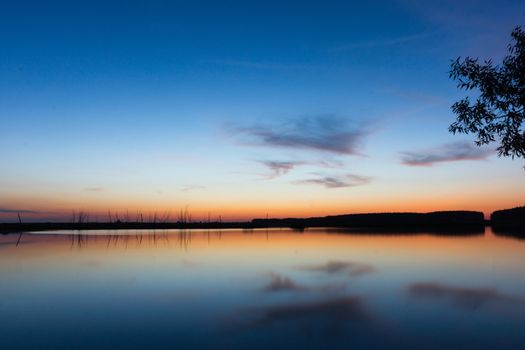 The picture shows a summer evening landscape