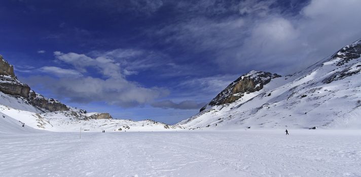 Landscape of mountain with some snow and a blue sky