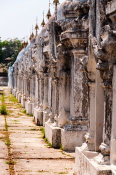 Row of small buildings in Kuthodaw Pagoda in Mandalay Myanmar Burma