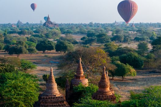 Temples and hot air balloon flying over Bagan Burma Myanmar