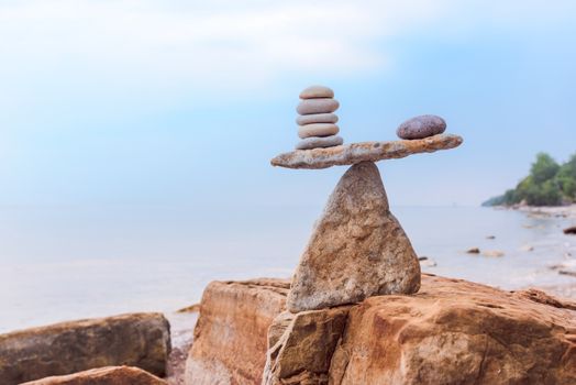 Balancing of stones each other on the coast