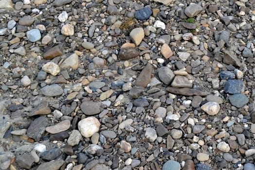 River fell.
Large and small colored stones are everywhere.