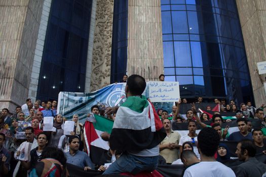 EGYPT, Cairo: Protesters gathered outside the Syndicate of Journalists building in Cairo, Egypt on October 18, 2015 in a show of support for Palestinians. The activists demonstrated against the recent attacks in Jerusalem, the West Bank and Gaza. They raised the flag of Palestine as some people stood on Israel's flag in anger.